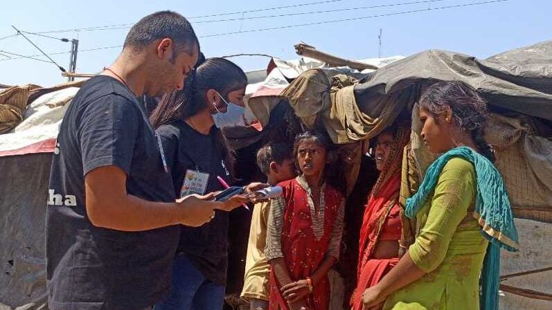 Medhavi Research Participants interviewing people from slum areas during their training